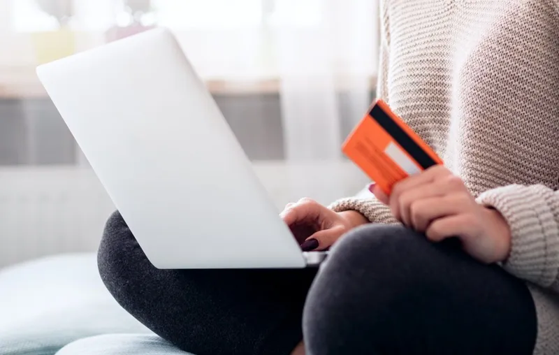 Woman with LapTop and credit card