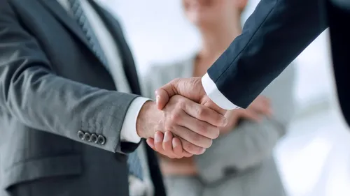 Handshake between two business men
